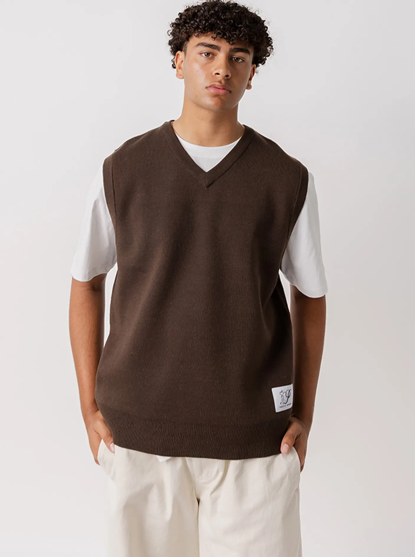 Pursuit of Happiness Jackets & Vests-Serif Logo Knitted Vest in Brown